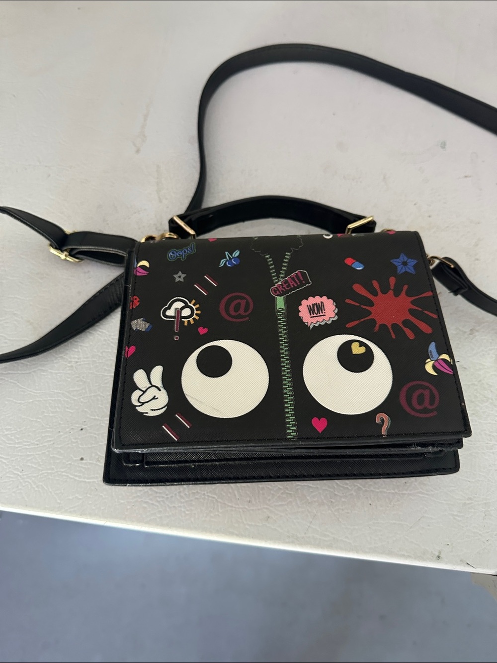 Black Playful Graphic Crossbody Bag with Eye Motif
